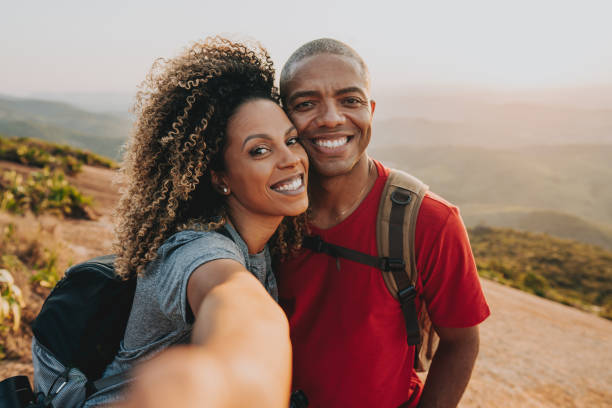 istock Couple walking on mountain trail 1504473010