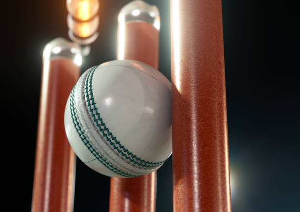 istock Ball Striking Illuminated Cricket Wickets 1504477852