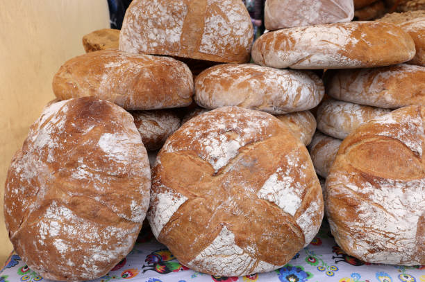 istock Freshly baked traditional bread at a street stall 1504493351