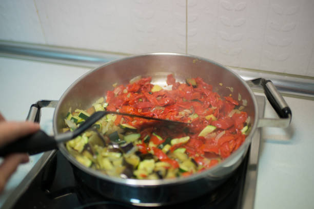 istock Unrecognizable person cooking vegetables 1504502856