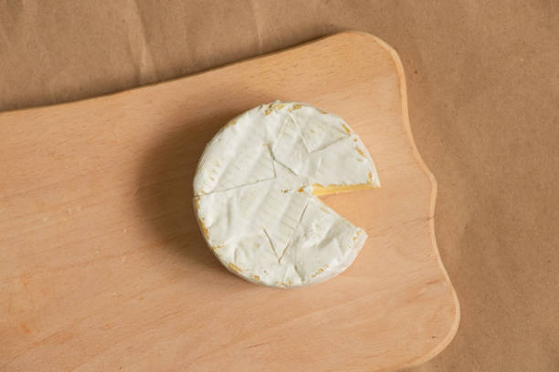 istock soft brie cheese lies on a table in the kitchen 1504506779