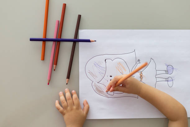 istock Mother and daughter painting a drawing 1504534559