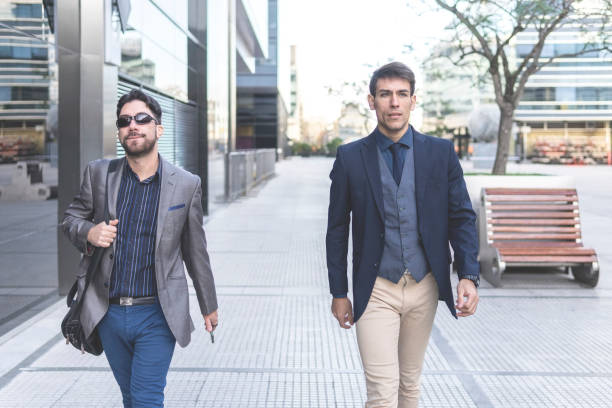istock Two latin businessmen walking down the street 1504546143