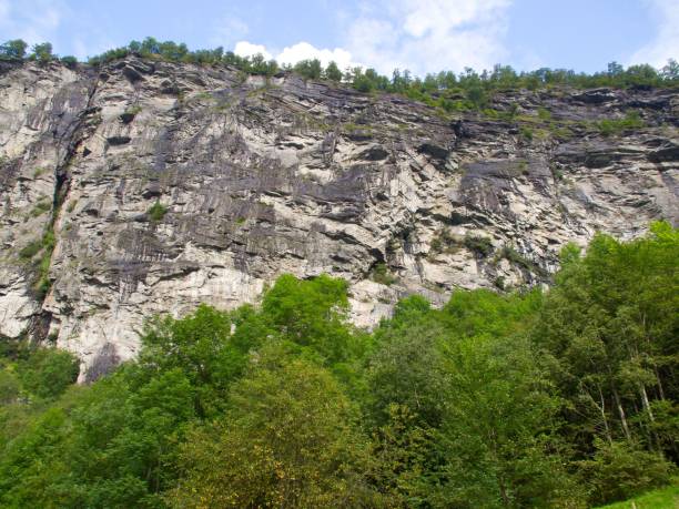 istock Scenic landscape of lush green trees and majestic cliffs. Molde, Norway. 1504631455