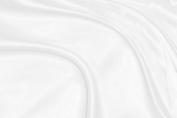 istock Ethereal Waves. Serene Abstraction of Soft White Cloth in a Minimalist Composition 1504680800