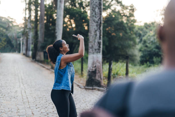 istock Woman taking photos during an outdoor stroll 1504777751