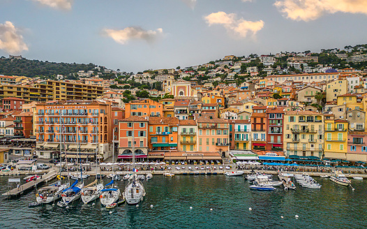 An aerial view of the town and port of Villefranche-sur-Mer, located on the Cote d'Azur, France.