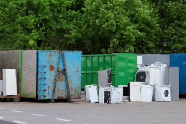 istock Awaiting disposal, the collected electronic-waste - washing machines, among others. 1504812945