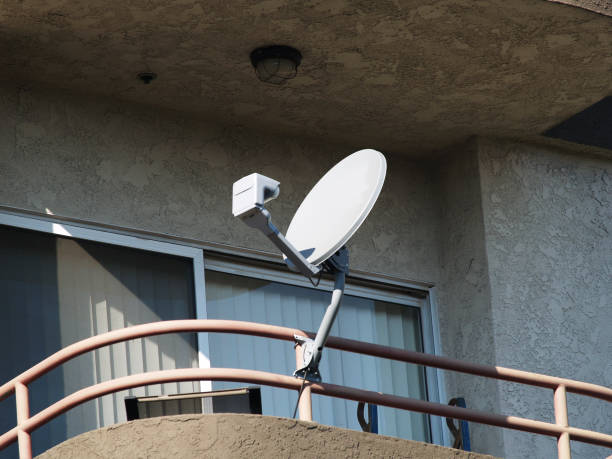 istock Satellite TV Dish Mounted On Apartment Balcony 1504822081
