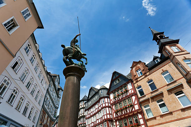 Monument on square in front of Rathaus in Marburg, Germany
