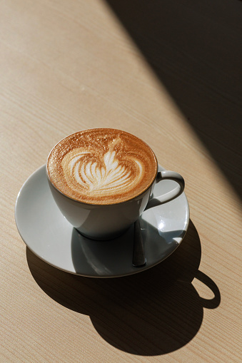 A latte is a coffee drink made with espresso and steamed milk.