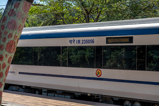 Khandala, India - April 02 2023: The Solapur Mumbai Vande Bharat Express heading towards Mumbai, at Khandala India.