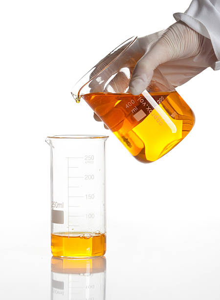 istock Hand holds flask to make a chemical reaction 150492453