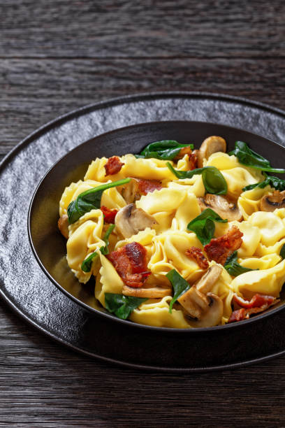 istock hot tortellini with mushrooms, spinach and bacon 1504938649