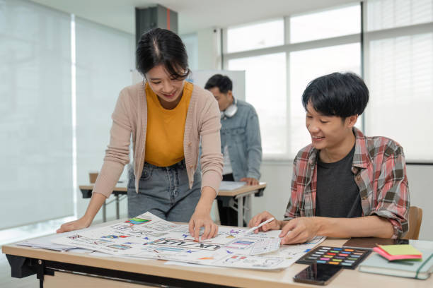 istock Brainstorm planing creative asian teamwork, Group of asia mobile phone app developer team meeting for share ideas about screen prototype layout for smartphone, ui, ux startup small business 1504973583