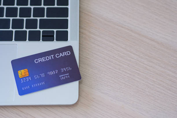 istock The blue credit card is on the laptop. 1504977643