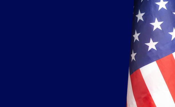 istock The American flag is on a blue background 1504977669