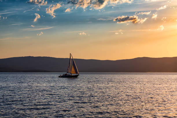 istock Yacht on a scenic lake in beautiful evening light 1504993385