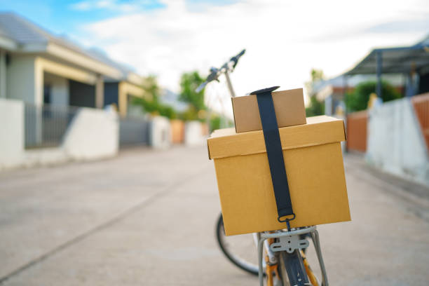 istock brown box placed on a bicycle preparing to deliver parcels to customers 1504997939