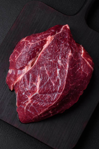 istock Fresh raw beef steak with salt, spices and herbs 1505089340
