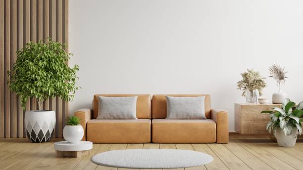 istock Modern living room wall mockup with leather sofa and decor on white background. 1505089368
