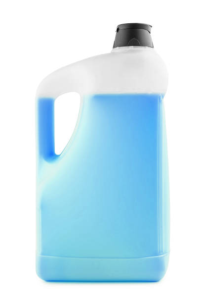 istock White plastic bottle with blue liquid and a black cap 1505109373