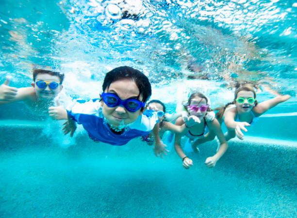 Underwater swimming perspective stock photo