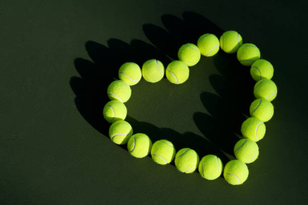 istock Tennis Balls in Heart Shape Love 150514075