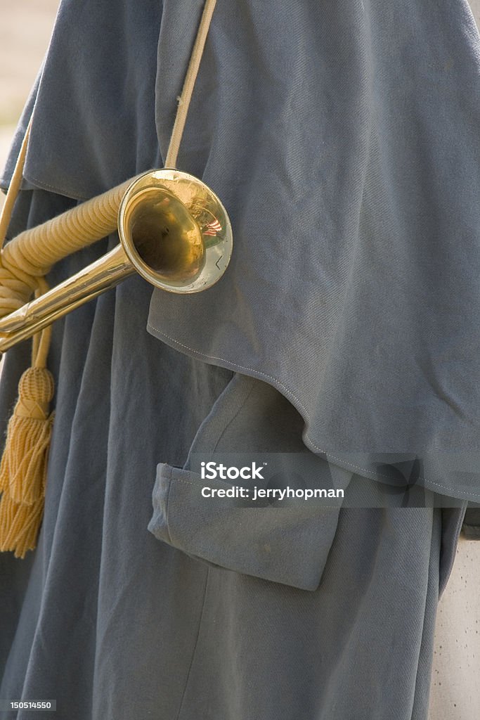 Bugle Old army cavalry cape & bugle. Brass Instrument Stock Photo