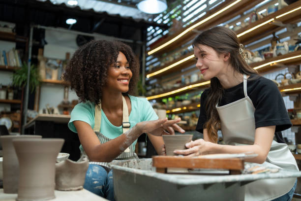 istock Blending Cultures: Girls from Different Backgrounds Shaping Clay Artistry 1505150498