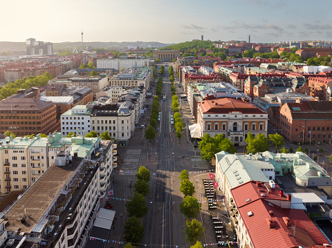 View over Avenyn (Kungsportsavenyn), the main boulevard of Gothenburg, in morning sunlight.