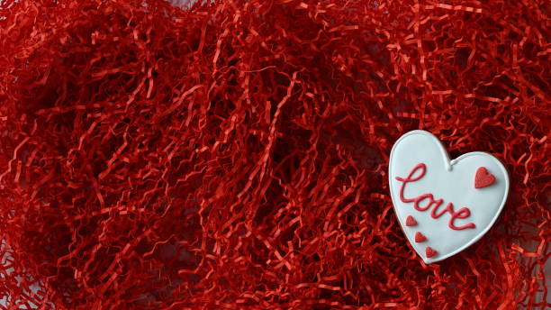 istock Love inscription on Gingerbread red background. Valentine Banner 1505172885