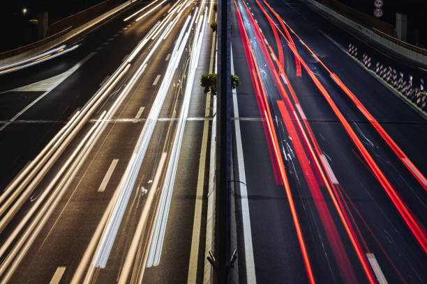 istock Light trails from the car traffic lights on highway 1505180071