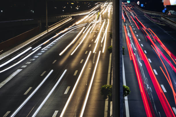 istock Light trails from the car traffic lights on highway 1505180117