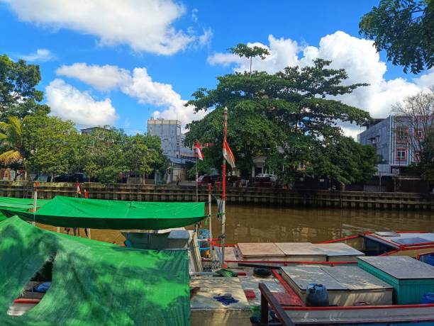 istock View of boat, river, bridge, sky, cloud and trees 1505182745