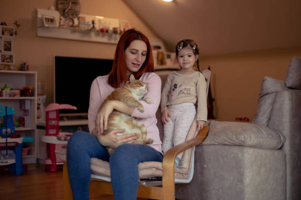 istock A mother, a child and a cat. 1505183365