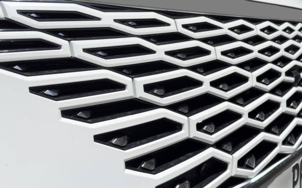 Radiator grille pattern. Car radiator grill close up. Chrome grill of big powerful car engine. stock photo