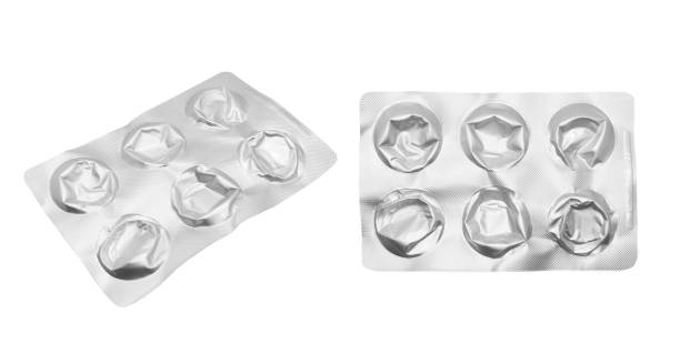 istock Empty pills of blister pack isolated on white background. Empty silver blister. Used blister pill. Empty blister pack from drugs. 1505239331