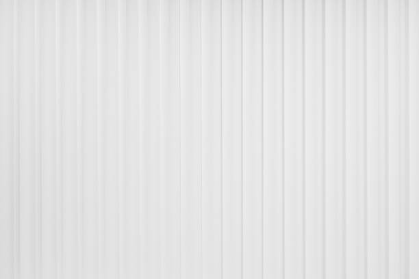 istock White abstract background of vertical striped pattern, top view, backdrop for advertising, design, card, poster, flyer, text in elegant soft light modern geometric simple style. 1505261573