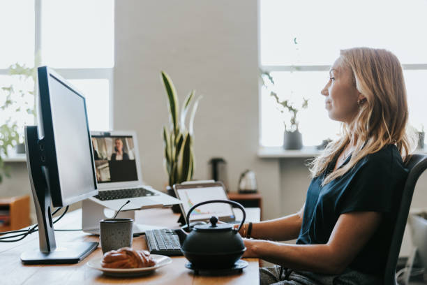 istock Confident Businesswoman working from open-space office. 1505295534