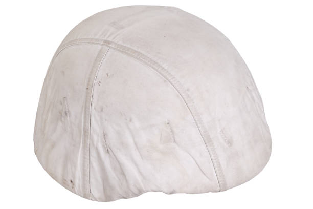 istock Army helmet with white winter camouflage cover 1505309316