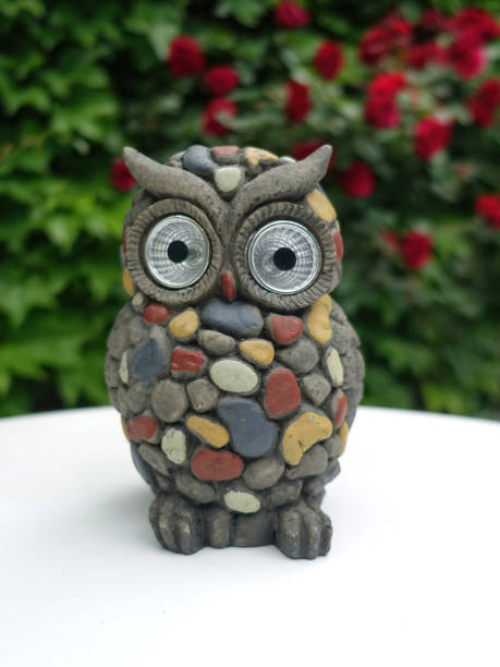 istock Solar lamp in the shape of an owl on the white table 1505314854