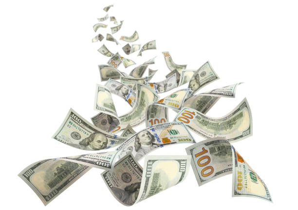 istock Flying 100 American dollars banknotes on white 1505328376