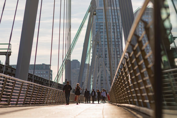 Free Stock Photo of A group of people walking on a bridge | Download ...