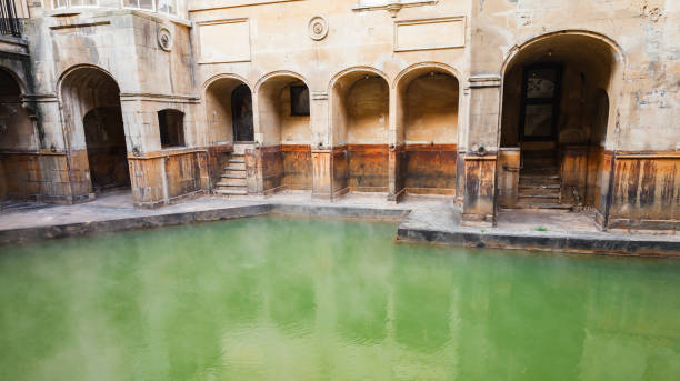 Bath, United Kingdom - November 2, 2017: Roman baths of Bath, Somerset. Inner pool view on a sunny day