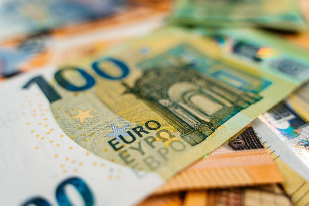 istock Hundred EURO Banknote On a Pile 1505411735