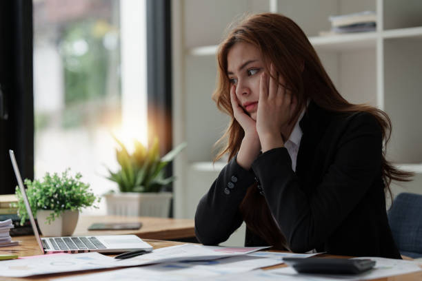 istock Stressed and Burnout. Business woman worry about her work at office 1505417126
