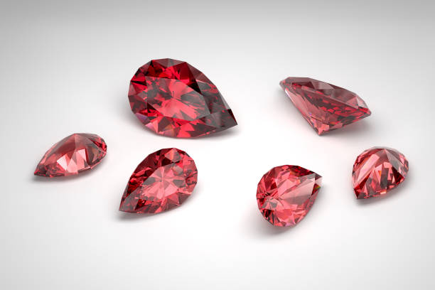istock Scattering of rubies of different sizes on a white background. Pear cut. 3d rendering. 1505418286