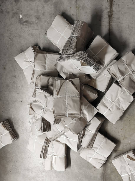 Reams of paper lying on the floor