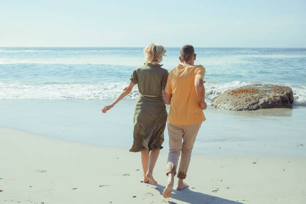 istock Affectionate senior couple on the beach 1505481978